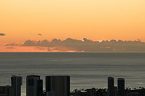  Early sunset over Waikiki, Hawai'i.  Photo by Milton Diamond.