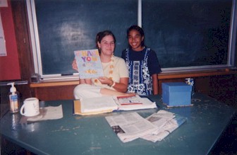 Erin and 6th grade student in classroom