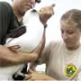 graduate students tagging a seabird, click for story