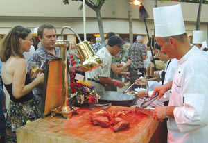 meat-eaters and chef at carving station