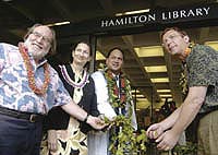 dignitaries in front of the Hamilton Library doors