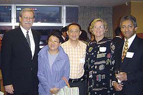 In Hong Kong, from left, UHAA Vice President Ren Hirose, McClain, Iris and alumnus Eddie Lam, Wendie McClain, alumnus Ananda R. Arawwawela