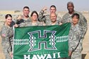 troops holding Manoa Warriors banner