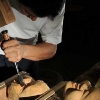 demonstrating kyogen mask carving technique