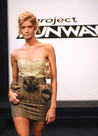 model on the runway in Jay Michael Sario's dress