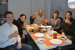 Researchers enjoy a celebration meal featuring spam musubi (photo by Sian Proctor)