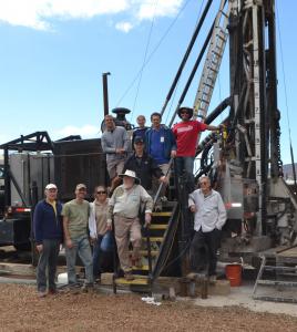 The Humuulu Groundwater Research Project team gather in front of the drill rig. Credit: Ka`o Sutton.