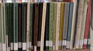 Ka Palapala annuals on a Hamilton Library bookshelf.