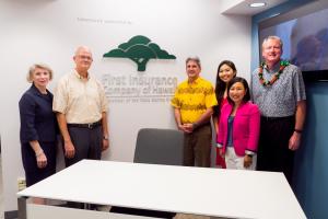 The University of Hawai'i and First Insurance Company of Hawaii celebrate the unveiling of the renovated Corporate Interview Rooms.