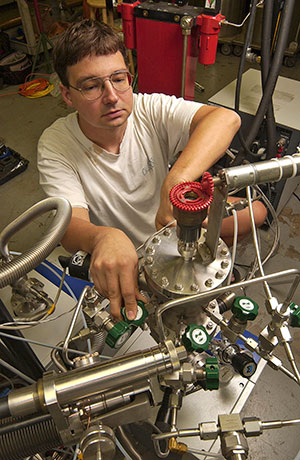 Ralf Kaiser working with scientific equipment