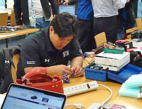 student working on micro robot