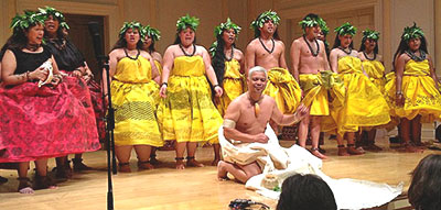 A group of hula dancers on stage