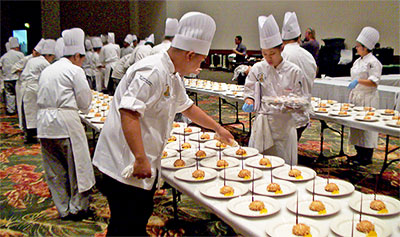 culinary students fixing food