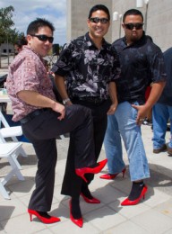 3 men in red heels