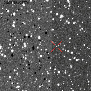 The Roadster appears as a tiny white dot among other dots