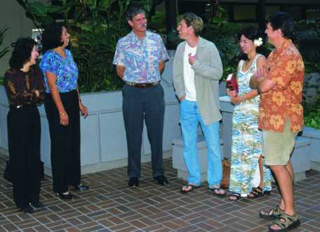 dean and students in the courtyard