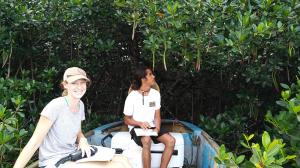 UH graduate students Paula Moehlenkamp and Aka Beebe conducting research at invasive mangrove island. UH graduate students Paula Moehlenkamp and Aka Beebe conducting research at invasive mangrove island.