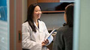 Yonamine with a patient.