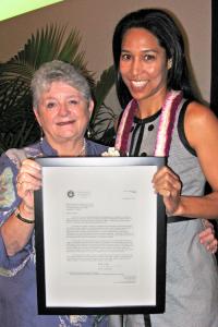 President Greenwood presents letter of commendation to Dr. Keiki-Pua Dancil, advisory council coord.