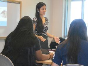 UH medical student Nina Ho discusses health issues with high school students.