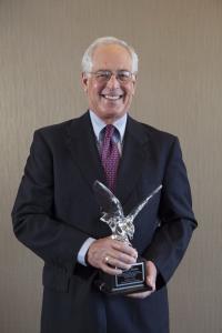 David Callies and the Crystal Eagle Award from the Owners' Counsel of America.