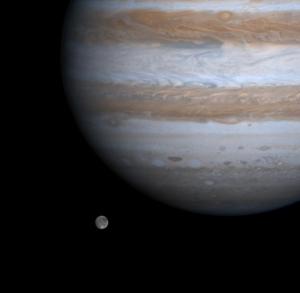 Ganymede alongside Jupiter, image from NASA's Cassini spacecraft. Credit: NASA/JPL/Univ of Arizona