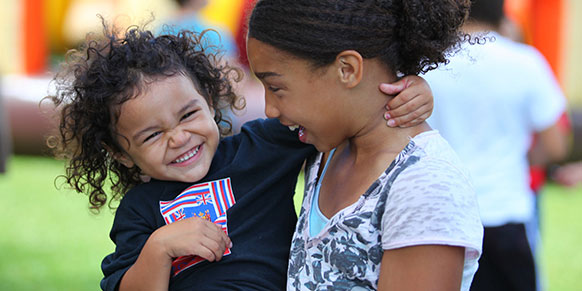 two young girls smiling