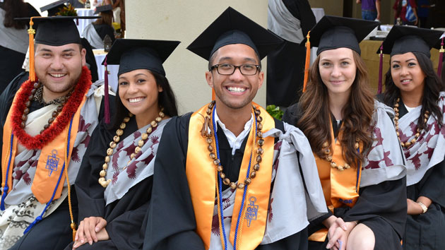 Students wearing commencement regalia