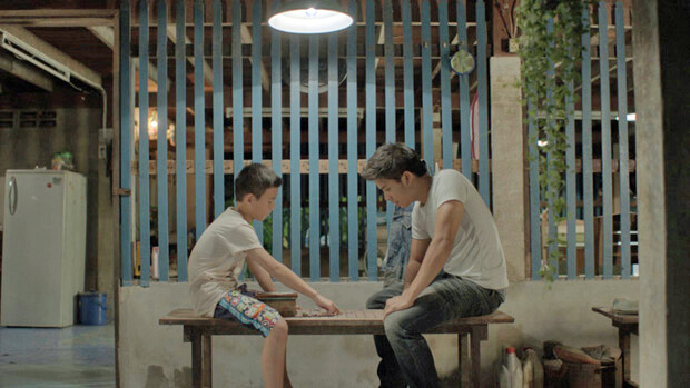 two people playing checker