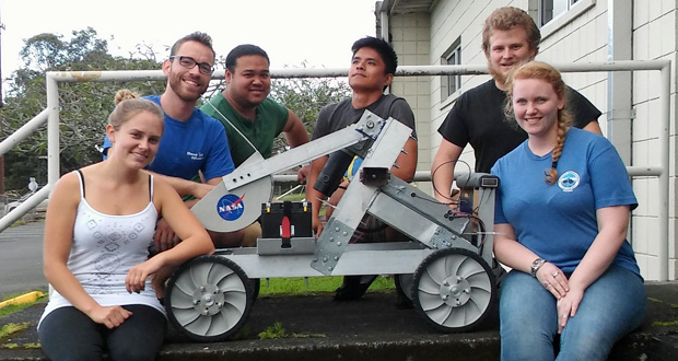 student with robotic vehicle