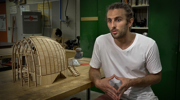 Joey Valenti with a scale model of his Albizia house