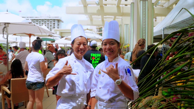 Two culinary students at an event
