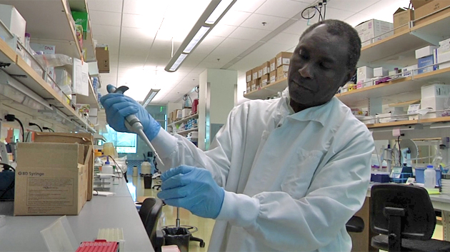 Turkson working in a lab