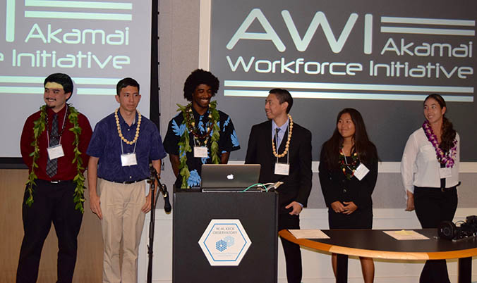 Interns standing behind a podium