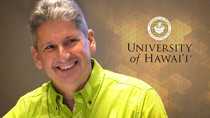 David Lassner and the University of Hawaii seal