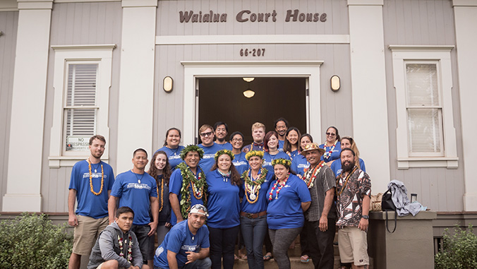 People standing in front of the Waialua Court House