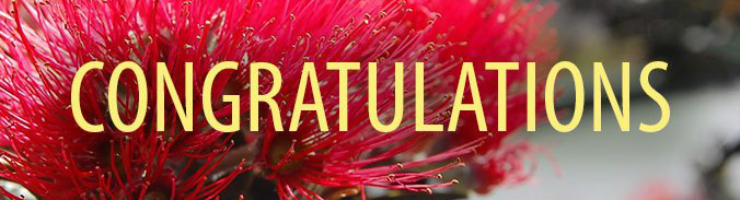 The word 'congratulations' in front of a flower