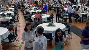 Conference with people around tables