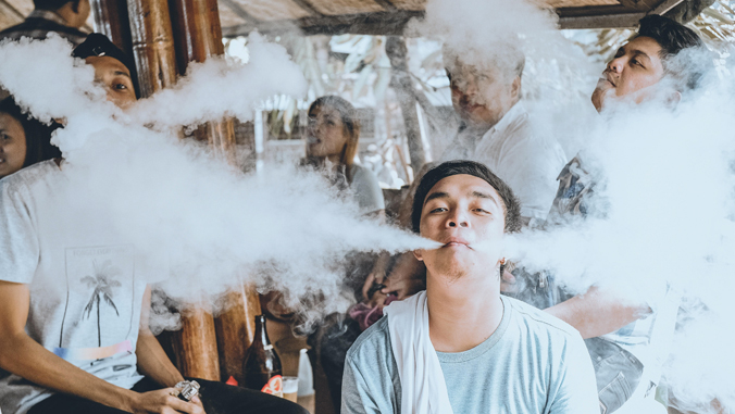 photo of kids smoking e-cigarettes
