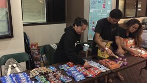 Volunteers setting up snack station