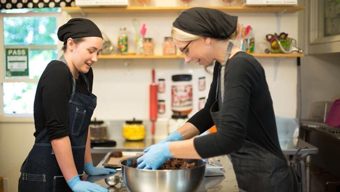 two people baking