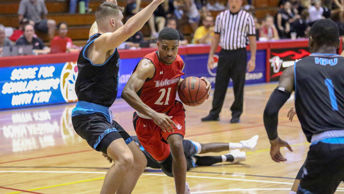 student playing basketball