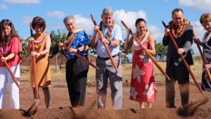 people breaking ground at the campus