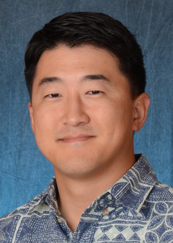 headshot of man smiling