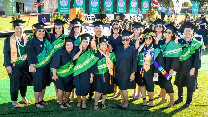 students in graduation regalia