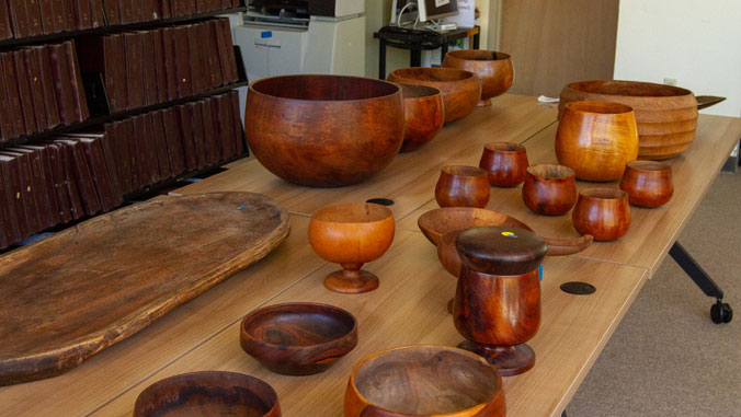 Hawaiian bowls and artifacts on a table