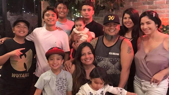 group photo of a family smiling