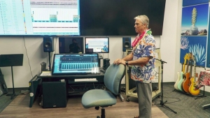 Katz standing in music studio