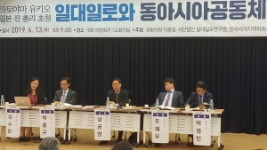 Speakers seated