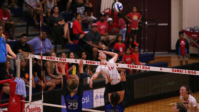 woman getting ready to hit volleyball